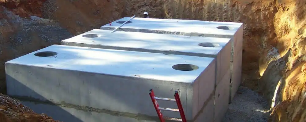 Septic tank installation site with a newly placed concrete tank in Buffalo, NY